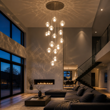 Lustre cascade cristal — cage d'escalier et double hauteur
