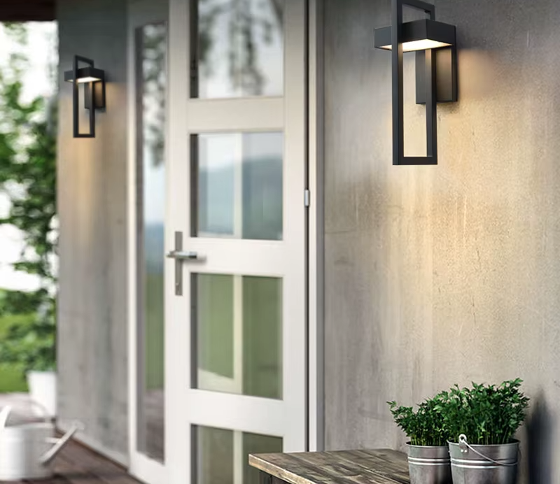 Rectangular outdoor wall lights on a porch wall