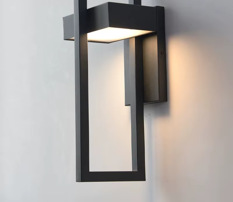 Rectangular black outdoor LED wall light, close view