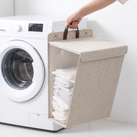 Folding wall-mounted laundry hamper with adhesive hooks – view 7
