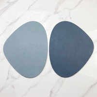 Teardrop two-tone faux leather placemat on marble with plate and gold cutlery – view 21