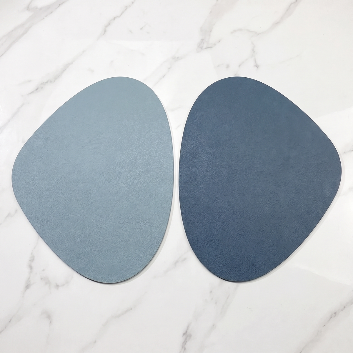 Teardrop two-tone faux leather placemat on marble with plate and gold cutlery – view 21