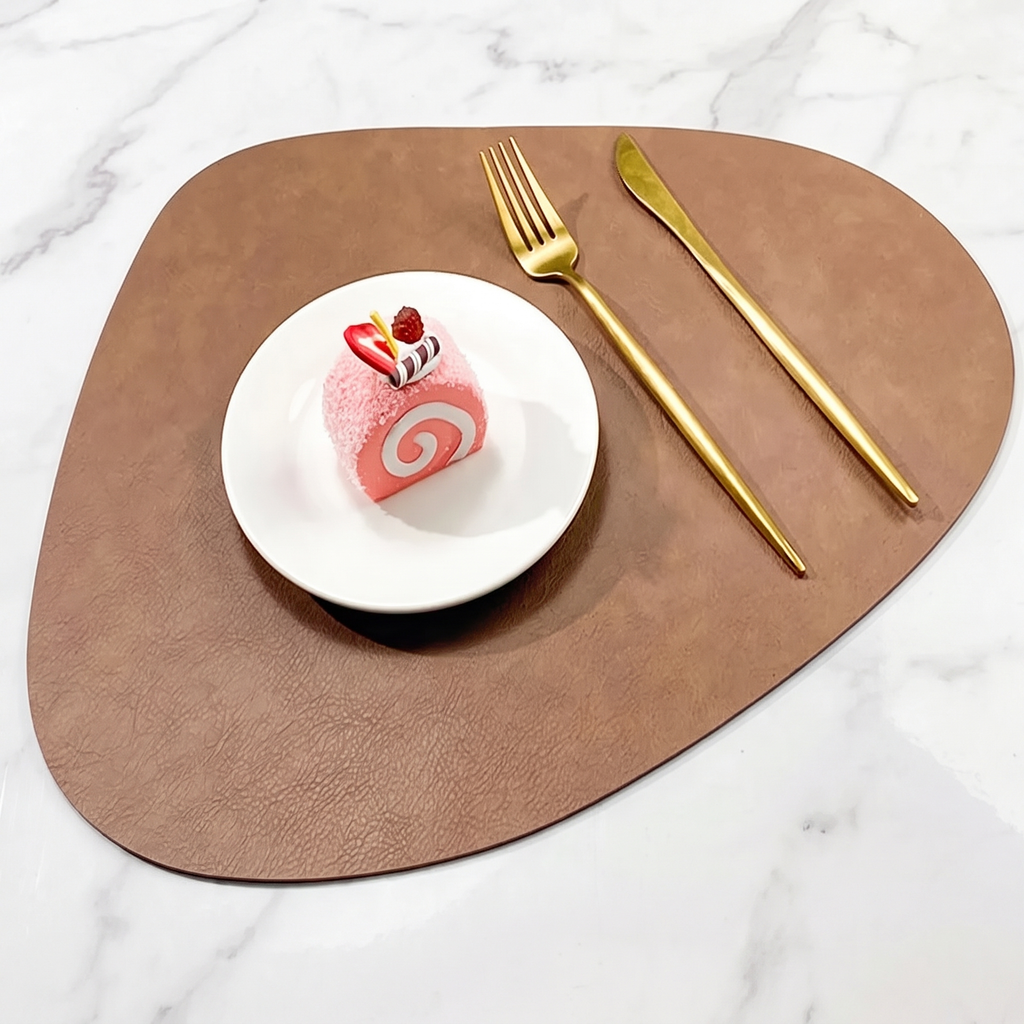 Teardrop two-tone faux leather placemat on marble with plate and gold cutlery – view 16