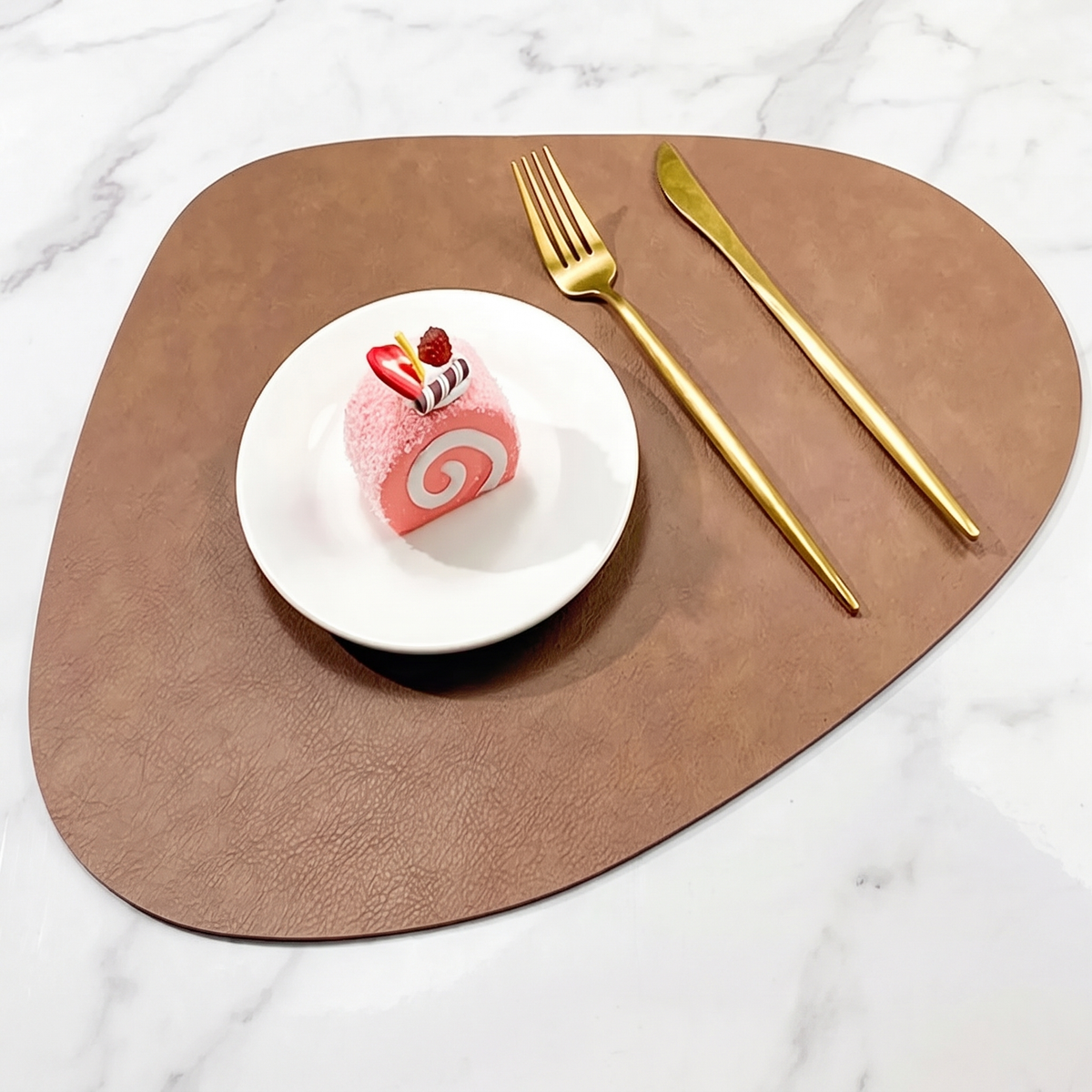 Teardrop two-tone faux leather placemat on marble with plate and gold cutlery – view 16