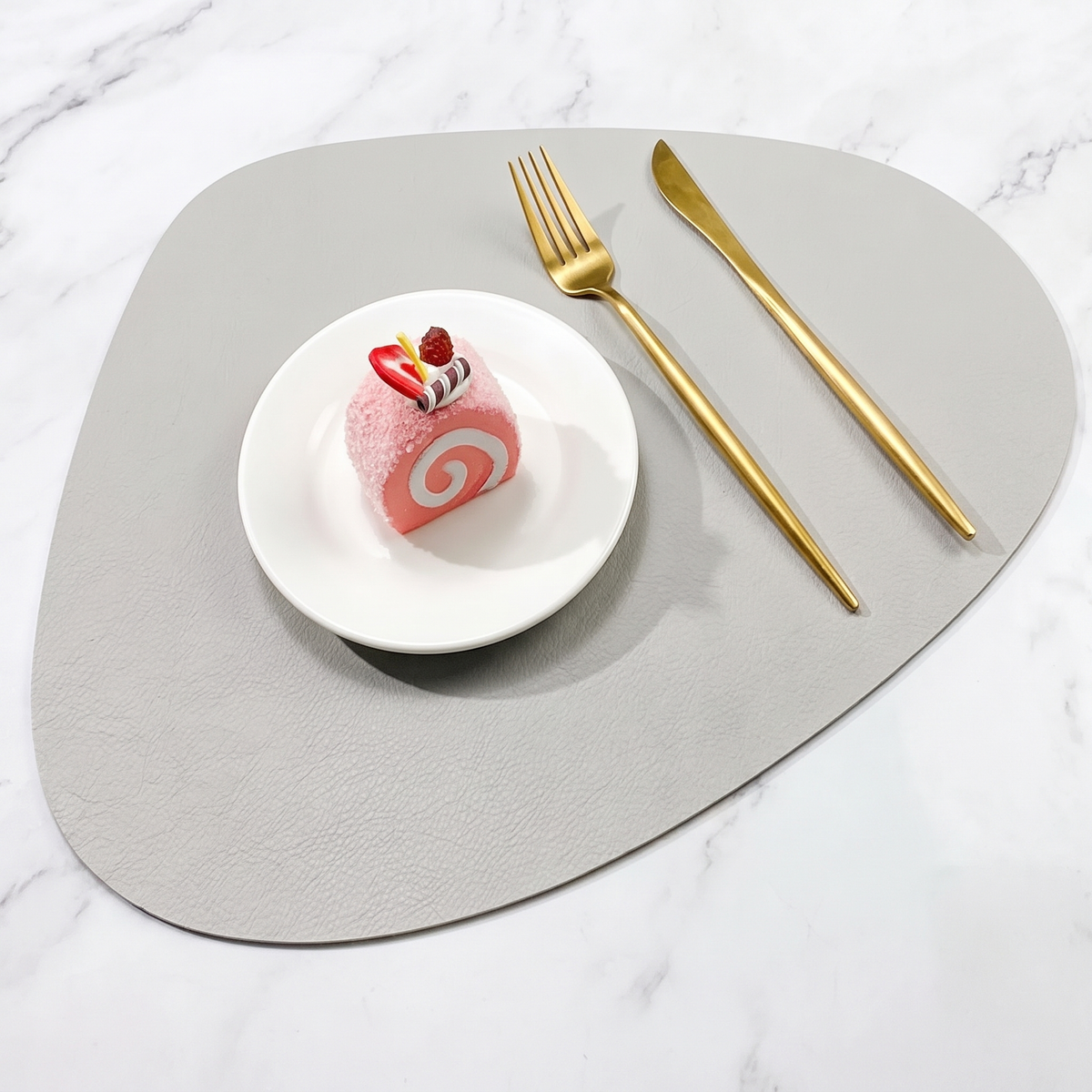 Teardrop two-tone faux leather placemat on marble with plate and gold cutlery – view 18