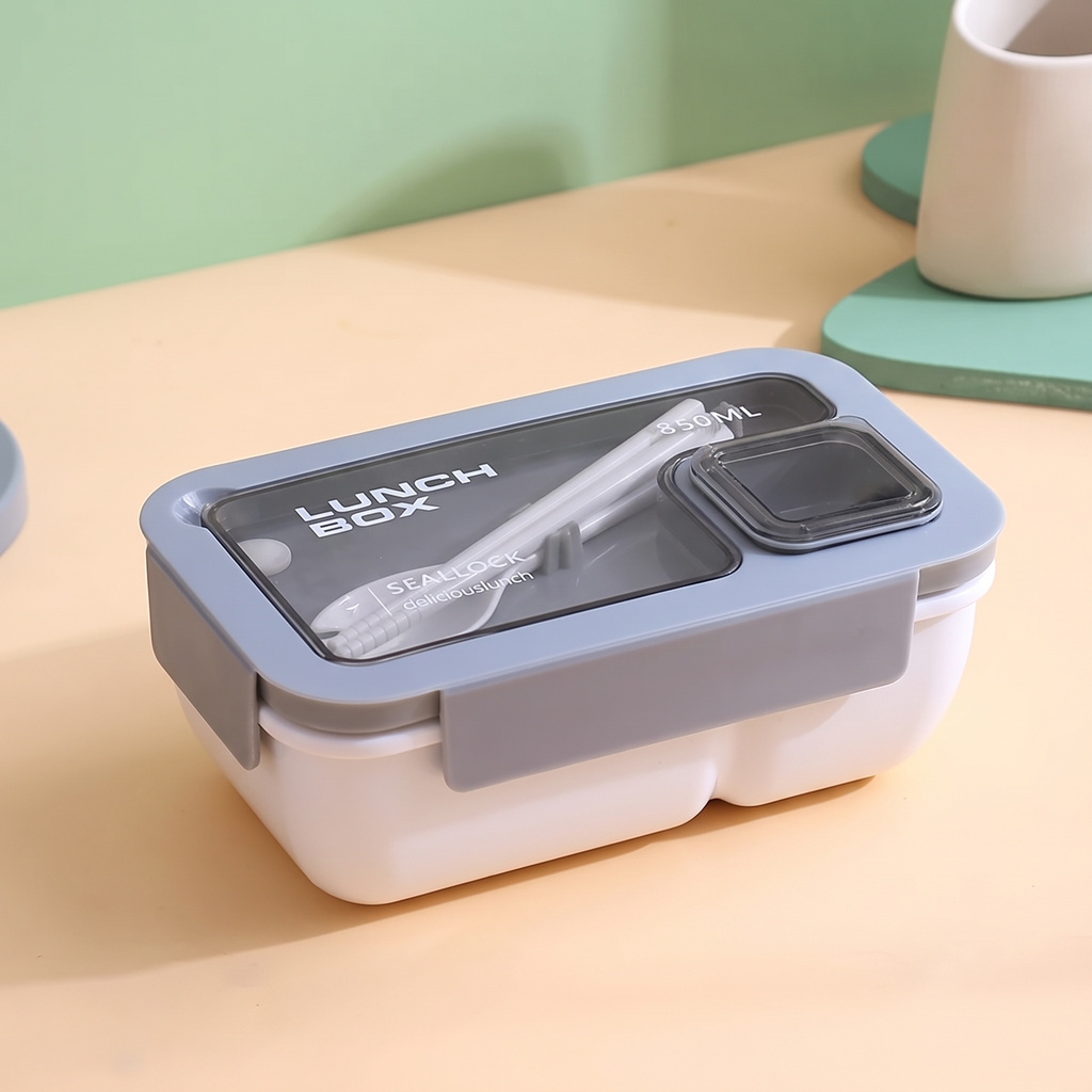 Two-compartment bento lunch box with spoon and fork in the lid – view 8
