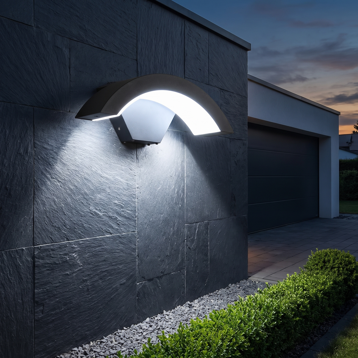 Curved outdoor LED wall light on a house facade at dusk – view 7