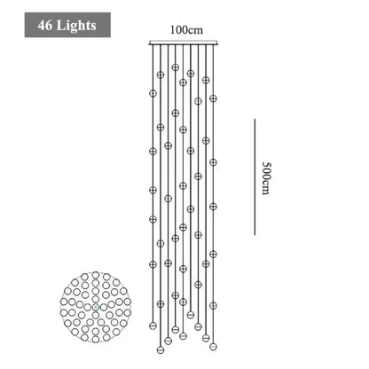Lustre cascade cristal — cage d'escalier et double hauteur